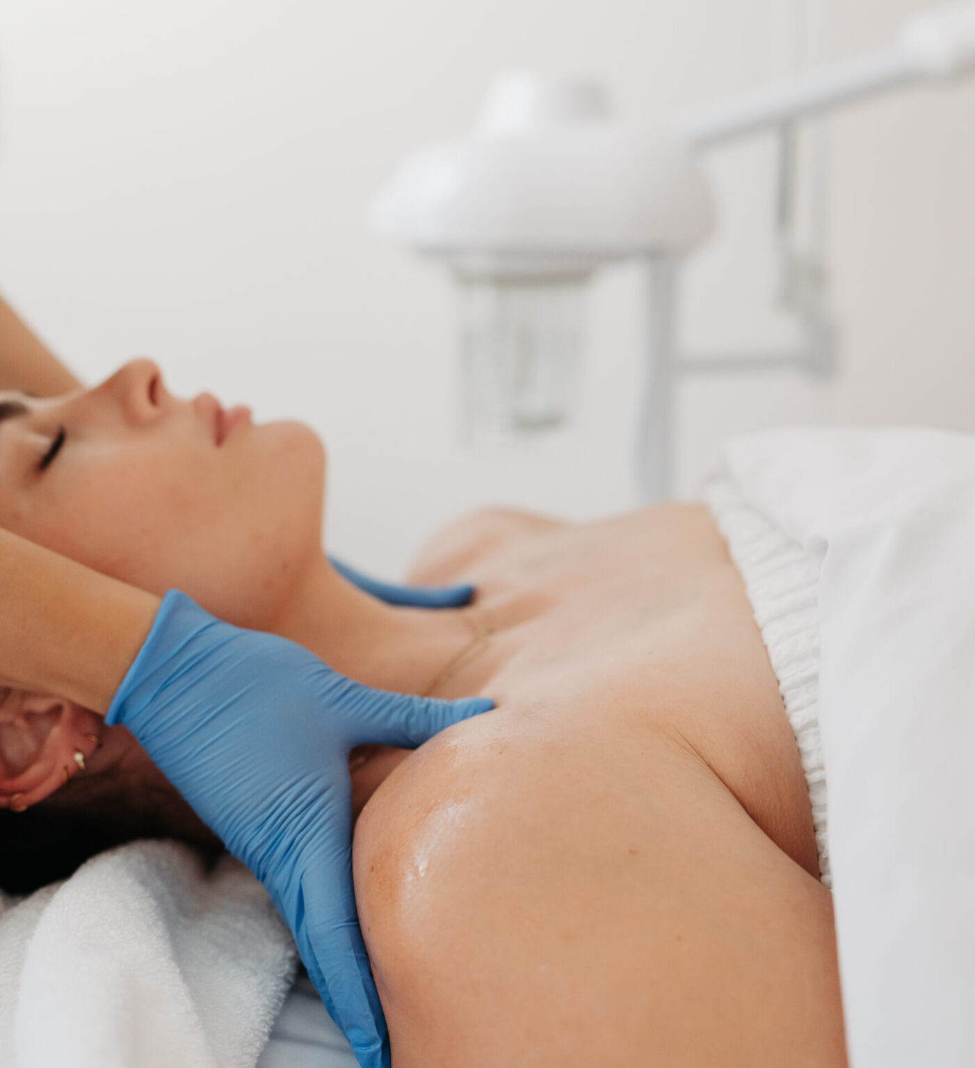 Client receiving a professional custom facial treatment at a medical spa for glowing, healthy skin.