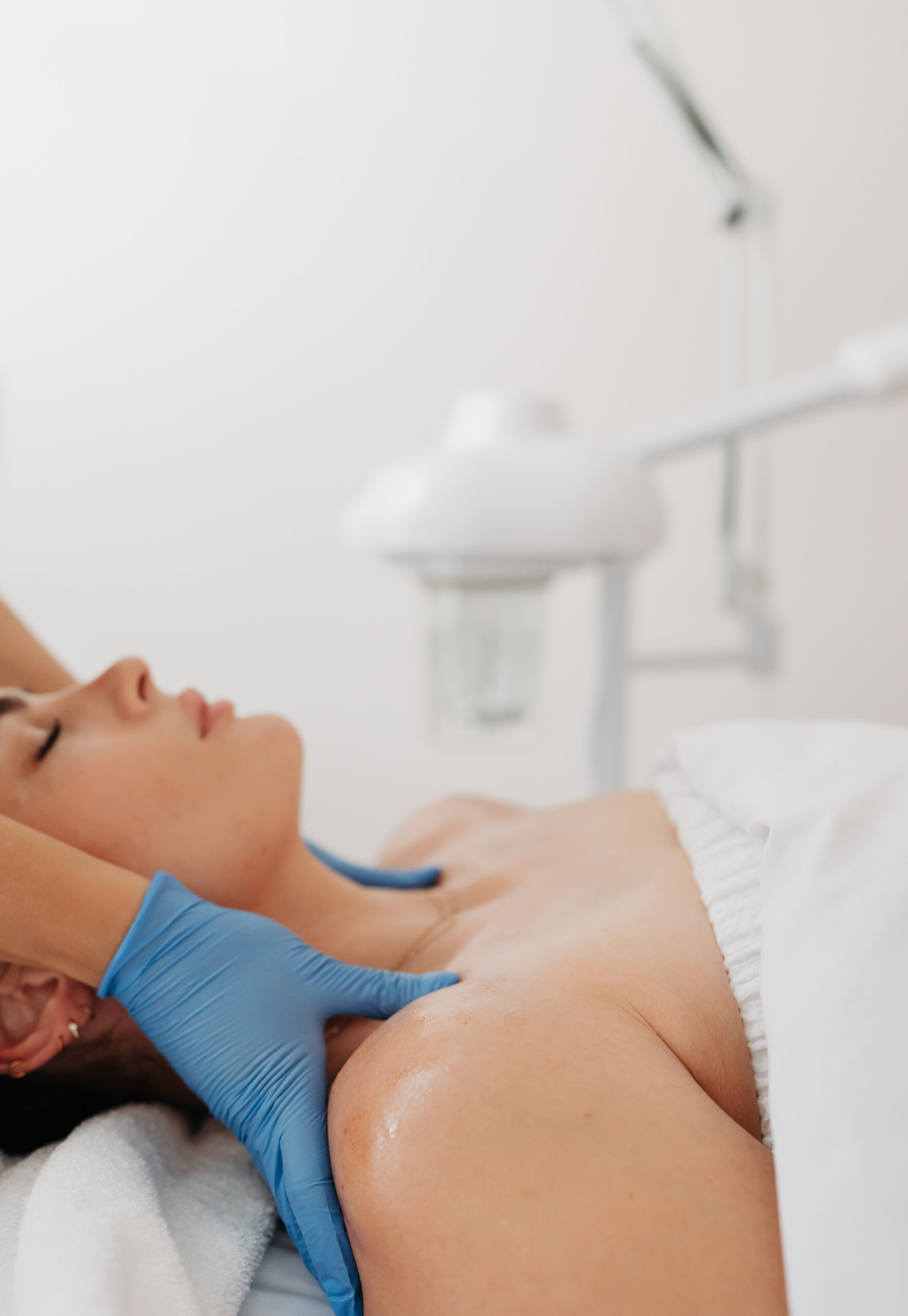 Relaxing facial provided by licensed aesthetician to treat acne and other skin concerns.